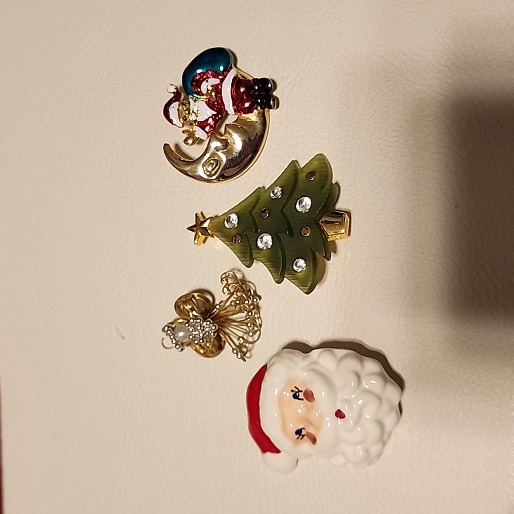 Christmas jewelry:  3 pins and a pendant